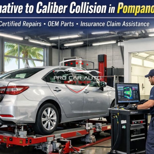 Factory certified collision repair shop in Pompano Beach performing OEM structural alignment and computerized diagnostics on sedan 