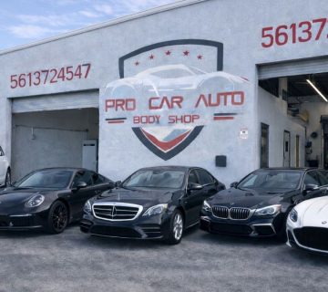 Broward County collision center exterior providing auto body repair and insurance claim services with luxury vehicles outside shop 